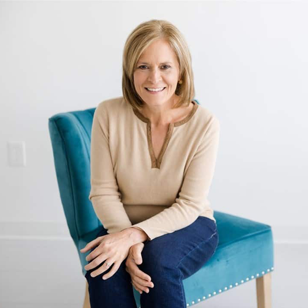 Juli on blue chair